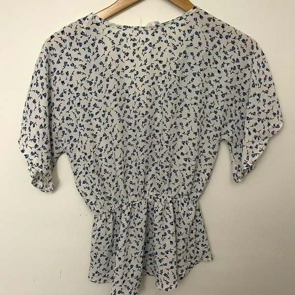 Sienna Sky Floral Peplum V-Neck Button Top - Picture 2 of 4